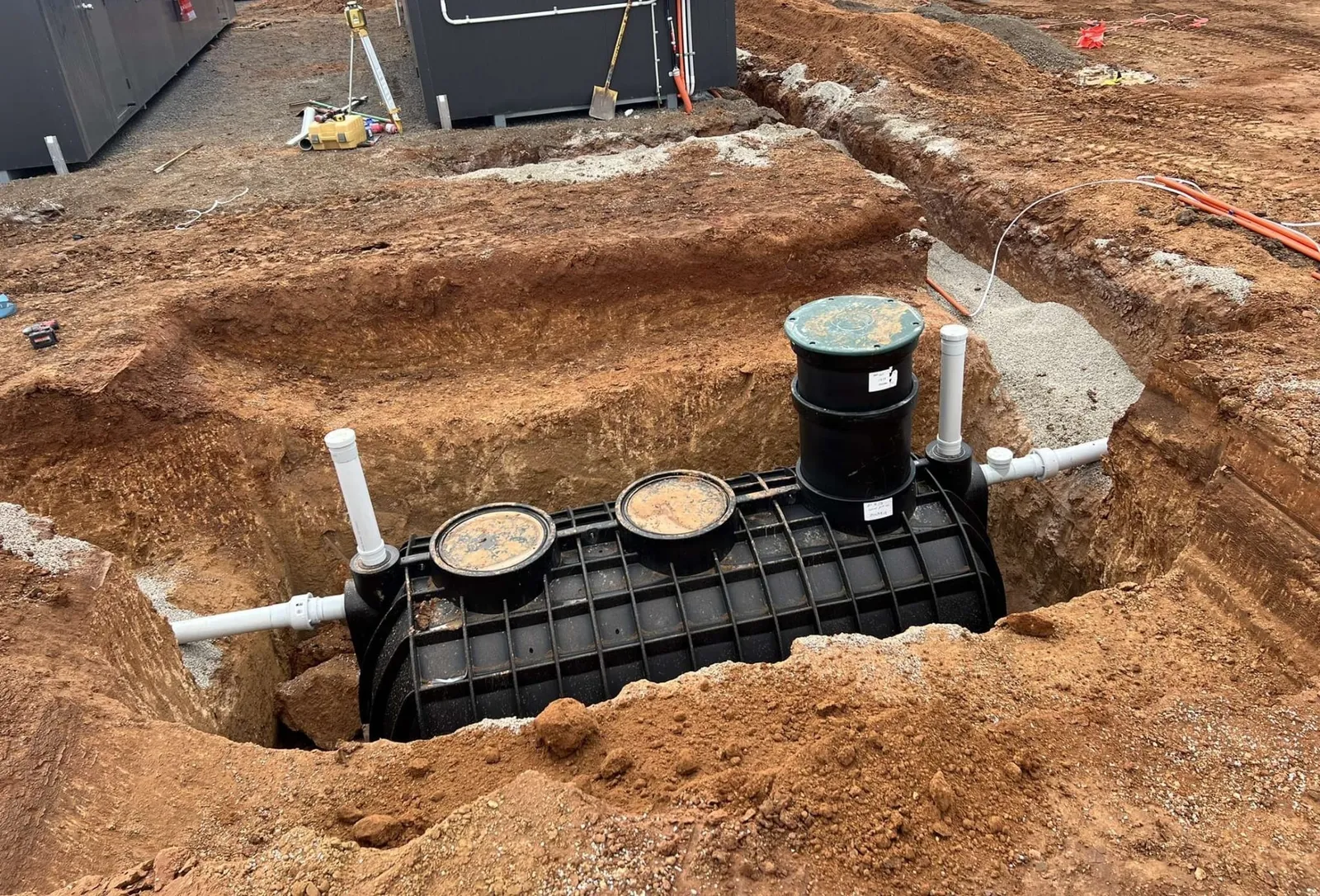 New septic tank set in an excavated pit in Lakeland, FL